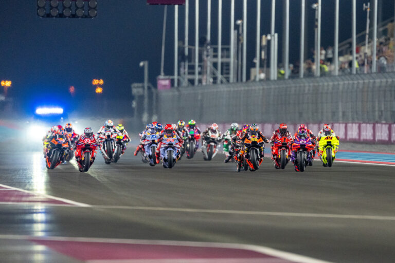 The MotoGP field sprints towards Turn at the start of the 2024 Qatar GP