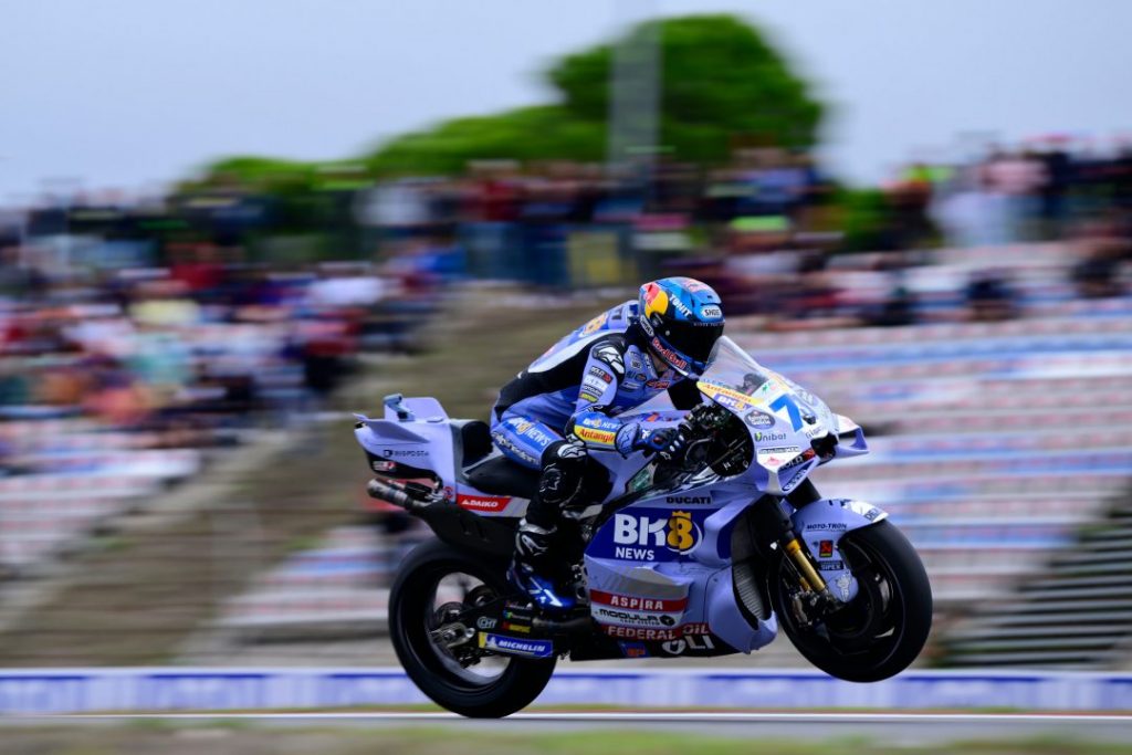 Alex Marquez on track at Valencia, leading the field during his dominant sprint victory.